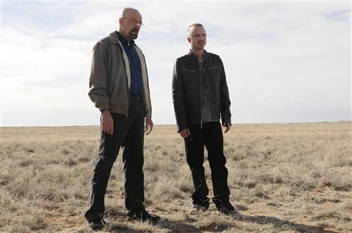 This image released by AMC shows Bryan Cranston as Walter White, left, and Aaron Paul as Jesse Pinkman in a scene from the season 5 premiere of "Breaking Bad."
