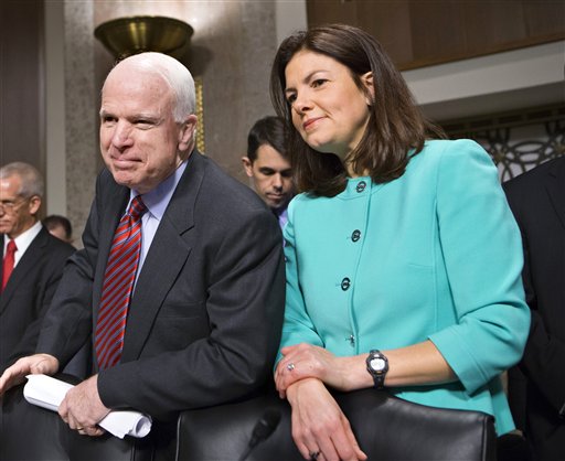 Sen. John McCain, R-Ariz., left, and Sen. Kelly Ayotte, R-N.H., are among lawmakers scheduled to attend a dinner meeting with President Obama Wednesday night.