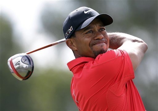 Tiger Woods hits from the third tee during the third round of the Cadillac Championship golf tournament Sunday in Doral, Fla. WGC-Cadillac World Golf Champioship