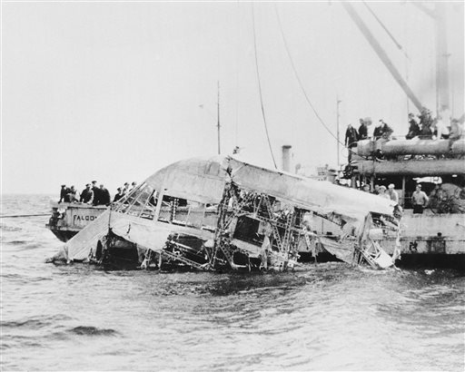 In this April 23, 1933 file photograph, the wreckage of the naval dirigible USS Akron is brought to the surface of the ocean off the coast of New Jersey. The Akron went down in a violent storm off the New Jersey coast. The disaster claimed 73 lives, more than twice as many as the crash of the Hindenburg, four years later. The USS Akron, a 785-foot dirigible, was in its third year of flight when a violent storm sent it crashing tail-first into the Atlantic Ocean shortly after midnight on April 4, 1933.