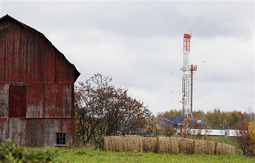 A drilling rig is set up near a barn in Springville, Pa., to tap gas from the giant Marcellus Shale gas field. The overview project will cover Pennsylvania, West Virginia and Ohio – where a frenzy of drilling is under way – as well as New York and other states in the East that have put a hold on new drilling.