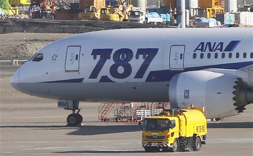An All Nippon Airways' Boeing 787 "Dreamliner" parks on the tarmac at Haneda airport in Tokyo in this Jan. 18, 2013, photo. Fifty planes have been delivered to eight airlines. Deliveries are currently halted, but Boeing is still building the planes and has said it still expects to deliver at least 60 this year.