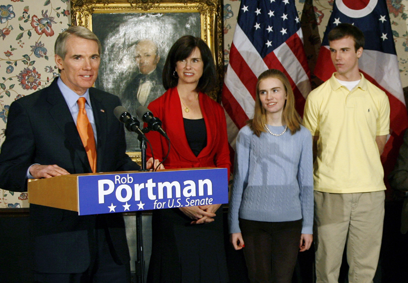 U.S. Sen. Rob Portman, from left, with his wife, Jane, daughter Sally, and son Will, after announcing that he will run for the U.S. Senate, in Lebanon, Ohio. Portman is now supporting gay marriage and says his reversal on the issue began when he learned his son Will is gay.