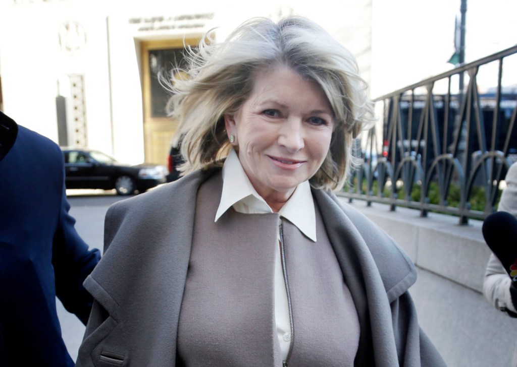 Martha Stewart arrives to court in New York on Tuesday. Macy's Inc. is suing the media and merchandising company Stewart founded for breaching an exclusive contract when she signed a deal with J.C. Penney in December 2011 to open shops at most of its stores this spring.