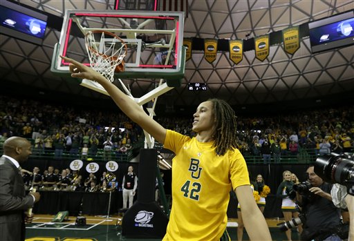 Baylor's Brittney Griner (42) acknowledges cheers from fans as she leaves the court following their second-round game against Florida State in the women's NCAA college basketball tournament Tuesday, March 26, 2013, in Waco, Texas. Baylor won 85-47. (AP Photo/Tony Gutierrez)
