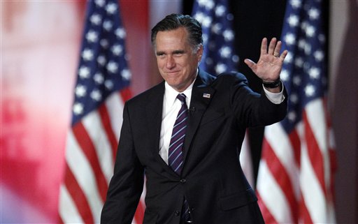 In this Nov. 7, 2012, photo, Republican presidential candidate Mitt Romney waves to supporters at an election night rally in Boston.