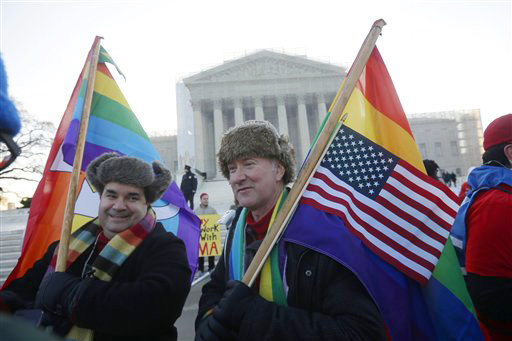 Marcus, left, and Daniel German-Dominguez stand outside the Supreme Court in Washington on Tuesday, before the court's hearing on California's voter-approved ban on same-sex marriage.