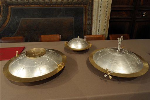 This picture made available by the Vatican newspaper L'Osservatore Romano shows the urns where each cardinal will place his folded ballot after voting inside the Sistine Chapel during the conclave at the Vatican.