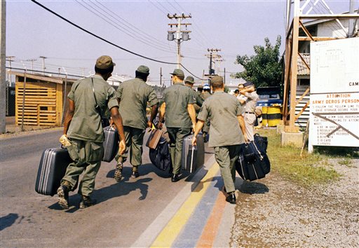 In this March 29, 1973, photo, Camp Alpha, Uncle Sam's out processing center, was chaos in Saigon. Lines of bored soldiers snaked through customs and briefing rooms. As the last U.S. combat troops left Vietnam 40 years ago, angry protesters still awaited them at home. North Vietnamese soldiers took heart from their foes' departure, and South Vietnamese who had helped the Americans feared for the future.