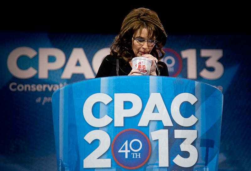Former Alaska Gov. Sarah Palin drinks from a 7-Eleven Super Big Gulp on stage while speaking at the 40th annual Conservative Political Action Conference in National Harbor, Md., on Saturday.