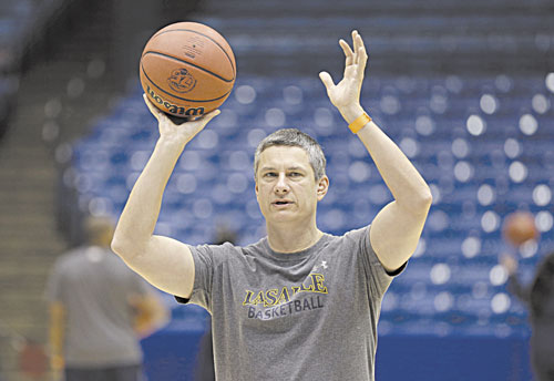 LEADING THE WAY: Head coach Dr. John Giannini and No. 13 La Salle have upset No. 4 Kansas State and No. 12 Ole Miss in their first two games in the NCAA tournament. Giannini, a former University of Maine basketball coach, and the Explorers will play Wichita State Thursday evening.