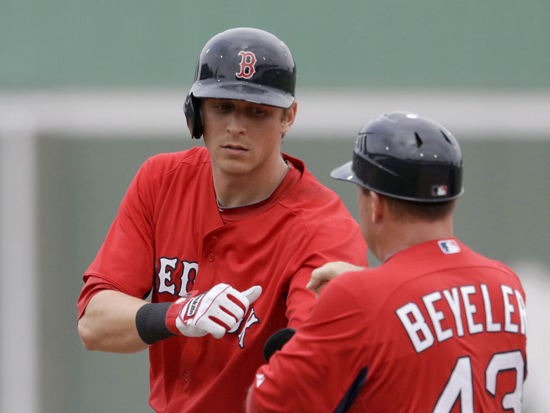 GETTING A SHOT: It took 26 years as a player, scout and coach, but Arnie Beyeler, right, is finally in the major leagues. Beyeler, who managed the Portland Sea Dogs for four seasons, is the Red Sox first base coach this season.