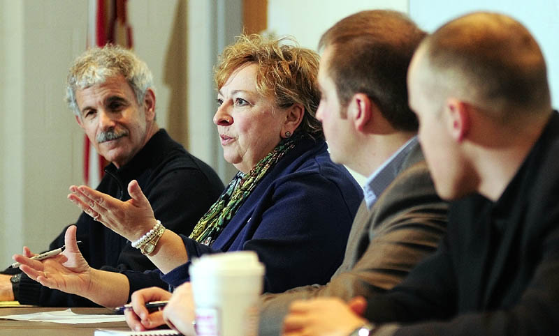 State Rep. Lori Fowle, D-Vassalboro, second from left, speaks during a legislative budget forum on Saturday at Augusta City Center. State Sen. Roger Katz, R-Augusta, left, and state Reps. Matt Pouliot and Corey Wilson, both R-Augusta, also took part.