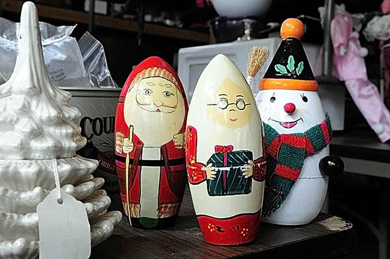 Christmas themed nesting dolls are among the items for sale at Bottles and More Redemption Shop in North Monmouth.