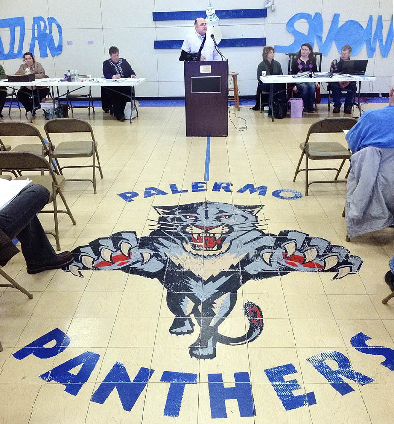 Dick Thompson serves as moderator during the annual town meeting on Saturday at the Palermo Consolidated School.