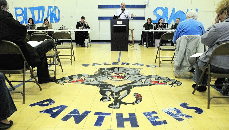 Dick Thompson serves as moderator during the annual town meeting on Saturday at the Palermo Consolidated School.