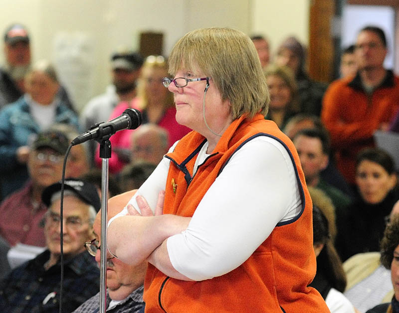 Vicki Kelley participates in the debate during the Pittston town meeting on Saturday.