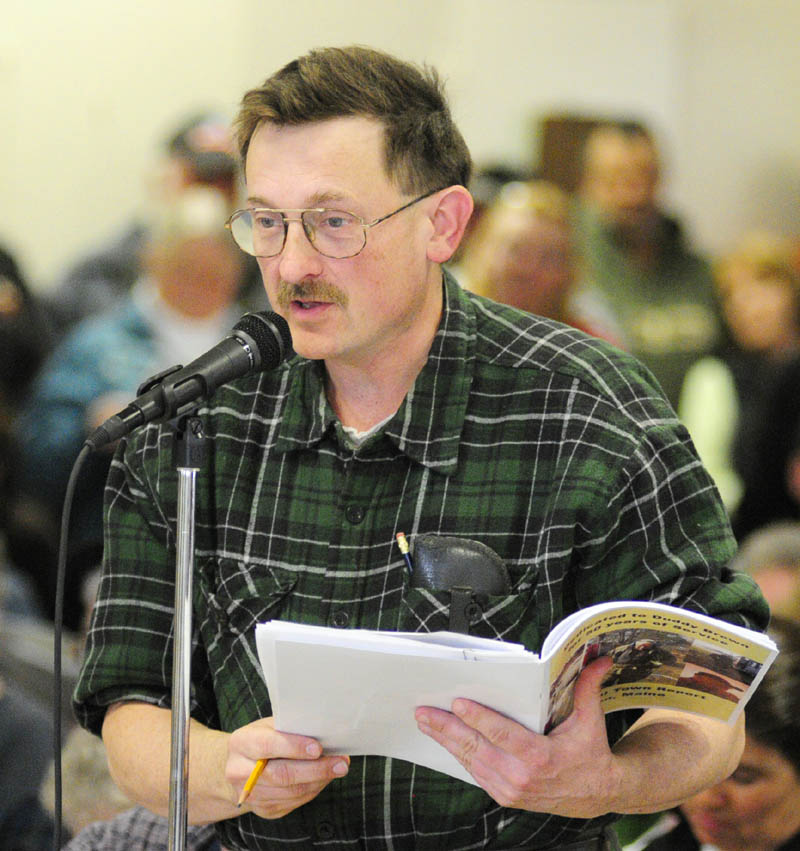 Tim Lawrence participates in the debate during the Pittston town meeting on Saturday.