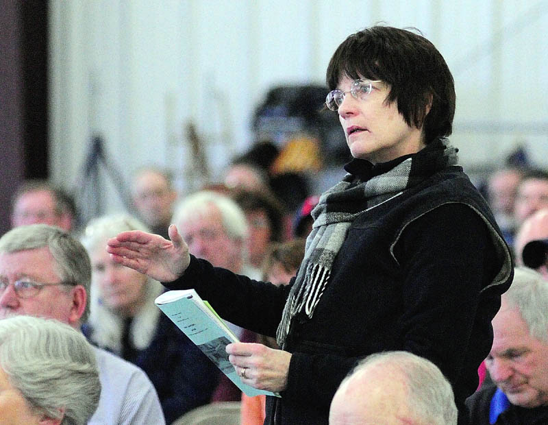 Jean Jessen speaks during debate on one of the articles at the West Gardiner Town Meeting on Saturday.