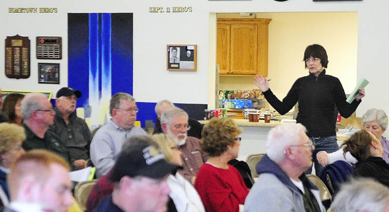 Jean Jessen speaks during debate on one of the articles at the West Gardiner Town Meeting on Saturday.