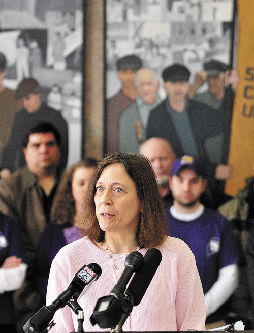 Dawn Kliphan, of Manchester, speaks during a news conference, held by the Maine State Employees Association, on Tuesday in the Cultural Building atrium in Augusta.