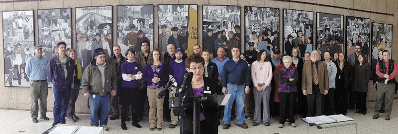 Union president Ginette Rivard speaks during a news conference, held by the Maine State Employees Association, on Tuesday in the Cultural Building atrium in Augusta.