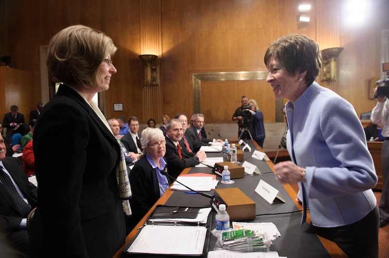 Sen. Susan Collins, R-Maine, talks with Hermon resident Kim Nichols, left, before a hearing of the Senate Special Committee on Aging about lottery scams targeting senior citizens. Nichols’ father, who lives in New Hampshire, lost $85,000 to the Jamaica-based scammers.