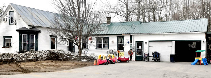 Children's toys can be seen outside the ABC 123 Daycare shortly after kids went back inside on Upper Main Street in Norridgewock on Monday. Horace Barstow, husband of Barbara Barstow who runs the facility, was arrested by police and charged with sexually assaulting three children who attend the daycare.