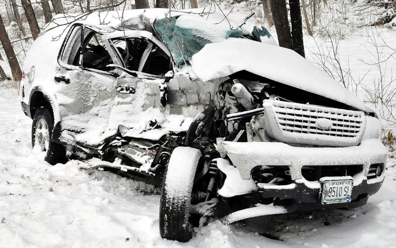 The vehicle sustained serious damage following a collision with a construction truck on snow-covered Route 139 in Benton on Tuesday.