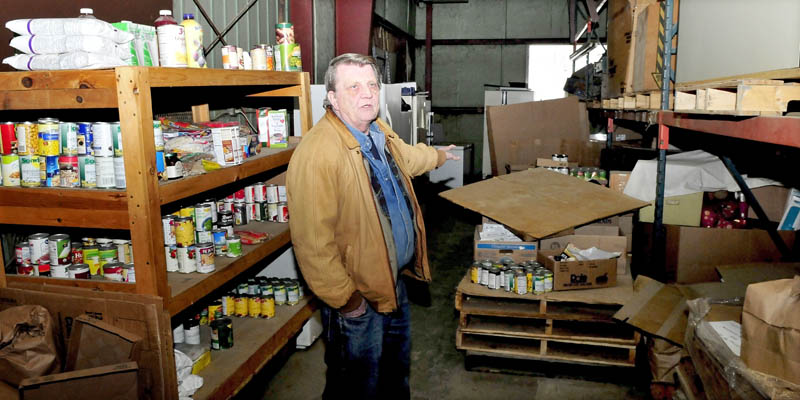 Pastor Ken Stevens talks about his expansion plans inside the current North East Dream Center in Winslow on Tuesday. Stevens' organization collects food which is distributed to area pantries.