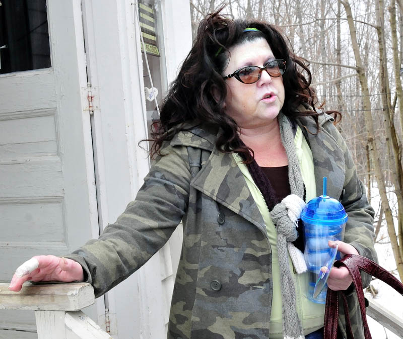Waterville resident Kimberly Morin Brunelle on Monday speaks about living next door to the 39 Washington Street residence where 90 people, including 81 Colby College students, were summonsed for underage drinking during a party on March 9.