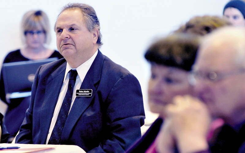 Peter Martin, government relations advisor for Oxford Resort Casino, listens to speakers during the Conference on Problem Gambling Awareness on Thursday.