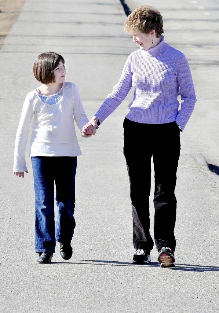 Destinee Pearl, of Augusta, left, and Valerie King, of Palermo, seen walking in Waterville recently.