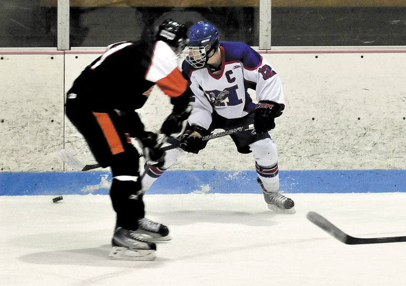 PLAYOFF CHASE BEGINS: Chase Cunningham (12) and the Messalonskee Eagles take on Hampden Academy in an Eastern B boys hockey semifinal game at 4:45 p.m. today at Sukee Arena in Winslow.