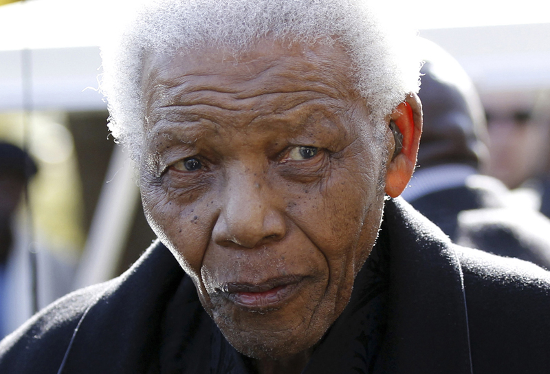 Former South African President Nelson Mandela leaves the chapel after attending the funeral of his great-granddaughter Zenani Mandela in Johannesburg, South Africa. The South African presidency says Nelson Mandela was re-admitted to hospital with a recurrence of a lung infection Thursday March 28, 2013. (2010 file photo)