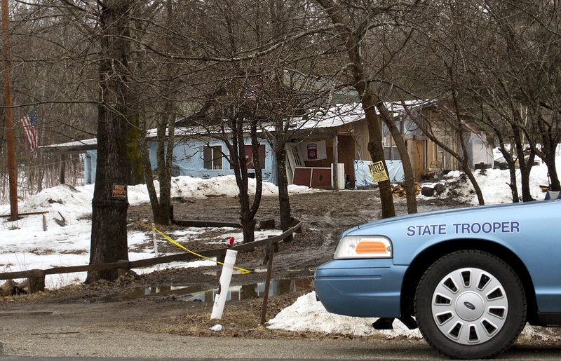 Maine State Police were restricting access Wednesday, March 13, 2013, to the residence at 450 Macwahoc Road (Route 2) in Molunkus Township, where investigators found the body of Lawrence Lewis, who was the victim of a homicide.