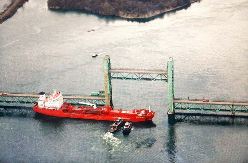 The tanker Harbour Feature sits sideways in the Piscataqua River after hitting the Sarah Mildred Long Bridge between Kittery and Portsmouth, N.H., on Monday.