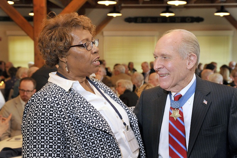 Retired Navy Capt. Thomas J. Hudner, who tried to save Ensign Jesse Brown during the Korean War, talks with Brown’s daughter, Pamela Brown Knight, at a luncheon celebration Friday at the Maine Maritime Museum. Hudner is the namesake of the USS Thomas Hudner.