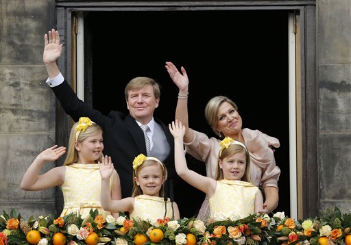 Dutch King Willem-Alexander and Queen Maxima appear on the balcony of the Royal Palace with their children, from left: Catharina-Amalia, Ariane, and Alexia in Amsterdam, The Netherlands on Tuesday.