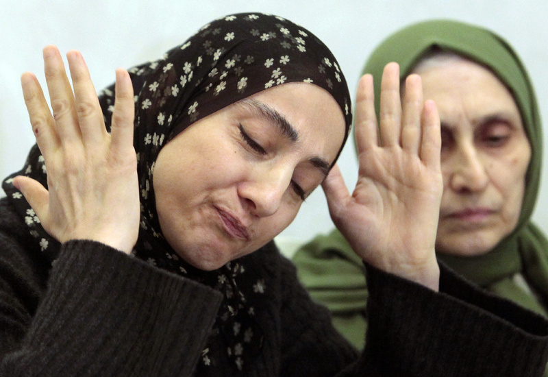 Zubeidat Tsarnaeva, the mother of the two Boston bombing suspects, speaks at a news conference as her sister-in-law, Maryam, listens in Makhachkala, in the southern Russian province of Dagestan, on Thursday.