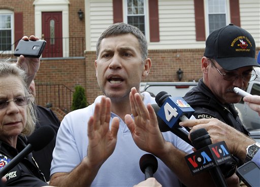 Ruslan Tsarni, uncle of the Boston Marathon bombing suspect, speaks with the media outside his home in Montgomery Village, Md., on Friday.