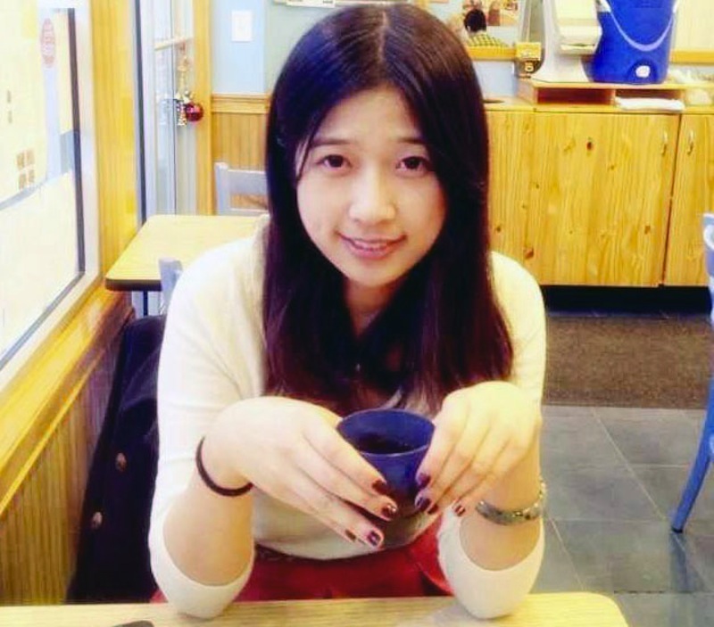 This undated photo provided by Meixu Lu shows Lingzi Lu in Boston. Boston University confirmed Wednesday, April 17, 2013, that Lingzi Lu, who was studying mathematics and statistics at the school and was due to receive her graduate degree in 2015, was among the people killed in the explosions at the finish line of the Boston Marathon Monday, April 15, 2013, in Boston. (AP Photo/Meixu Lu)