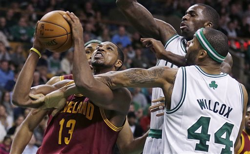Cleveland Cavaliers forward Tristan Thompson, left, drives to the basket against Boston Celtics forward Chris Wilcox (44) during the second half of an NBA basketball game in Boston, Friday, April 5, 2013. Thompson had 29 points in the Cavaliers 97-91 win. (AP Photo/Charles Krupa)