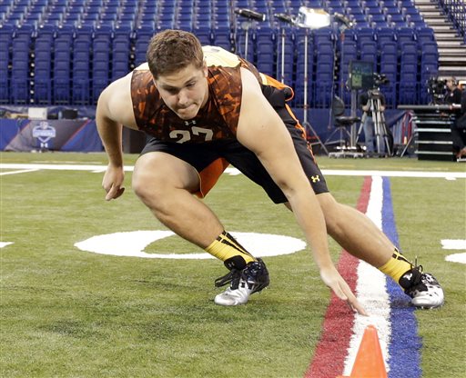 Texas A&M offensive lineman Luke Joeckel runs a drill during the NFL football scouting combine in Indianapolis in this Feb. 23, 2013, photo. "It's always nice when the O-line gets some respect," said Joeckel after being taken No. 2 by Jacksonville."