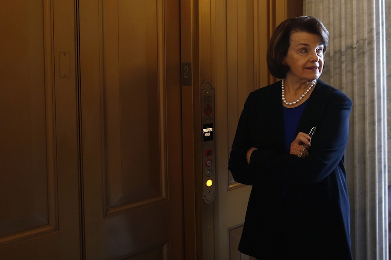 Sen. Dianne Feinstein, D-Calif. waits for an elevator on Capitol Hill in Washington, Wednesday, April 17, 2013, after speaking about gun legislation on the Senate floor. A bipartisan effort to expand background checks was in deep trouble Wednesday as the Senate approached a long-awaited vote on the linchpin of the drive to curb gun violence. (AP Photo/Charles Dharapak)