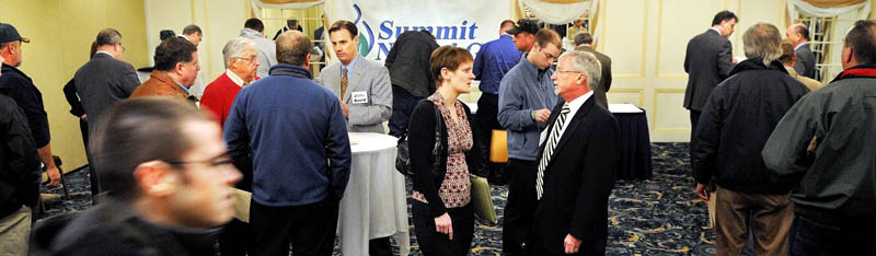 Job seekers attend the job fair Wednesday for Summit Natural Gas in Augusta.