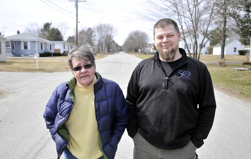 Penny Rafuse, left, Glenn Parkhurst and other residents of Violette Avenue in Waterville, where Ayla Reynolds lived, continue to keep the little girl in their thoughts. Ayla, whose third birthday would be Thursday, was reported missing in Dec. 2011.