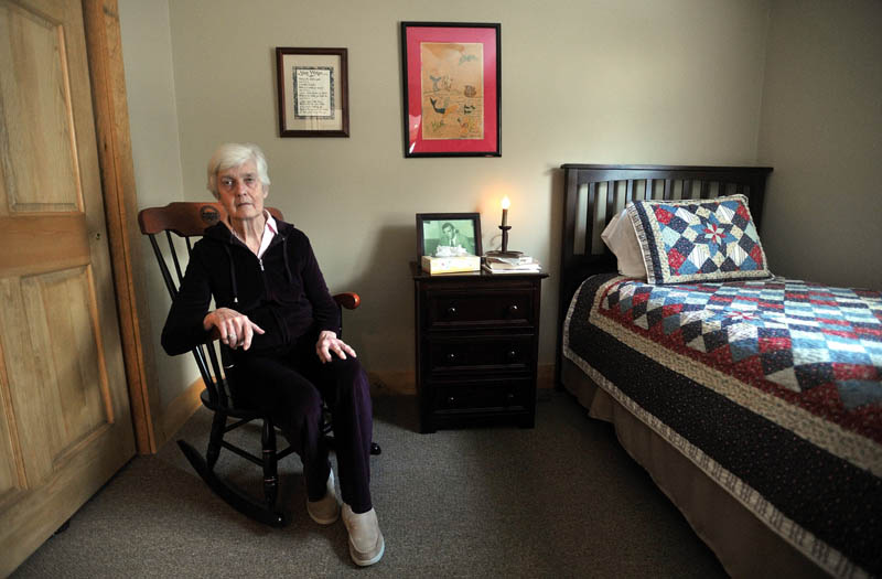 Martha Fabian sits in her room at Bedside Manor on Belgrade Road in Oakland on Wednesday.