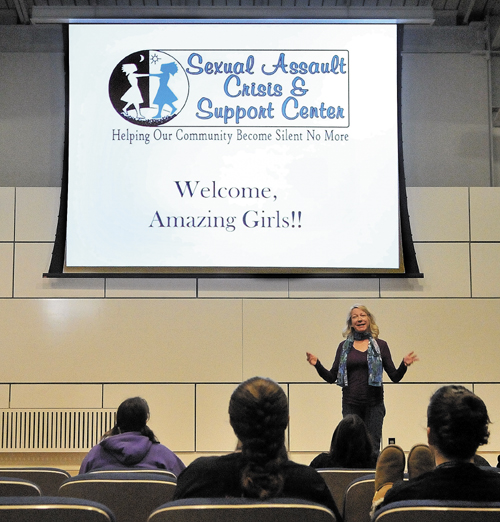 Kathleen Paradis, community educator for the Sexual Assault Crisis and Support center in Winthrop gives a presentation on cyber-hate during the Girls Rock! conference sponsored by Hardy Girls Healthy Women at Colby College on Friday.
