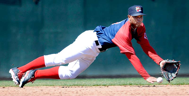 Portland shortstop Xander Bogaerts makes a diving grab in the third inning against the New Britain Rock Cats Sunday at Hadlock Field. Bogaerts was able to force a runner out at second base with a short toss from the ground.